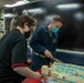 Sailors Aboard USS Ralph Johnson (DDG 114) Celebrate Birthday of Pfc. Ralph Johnson