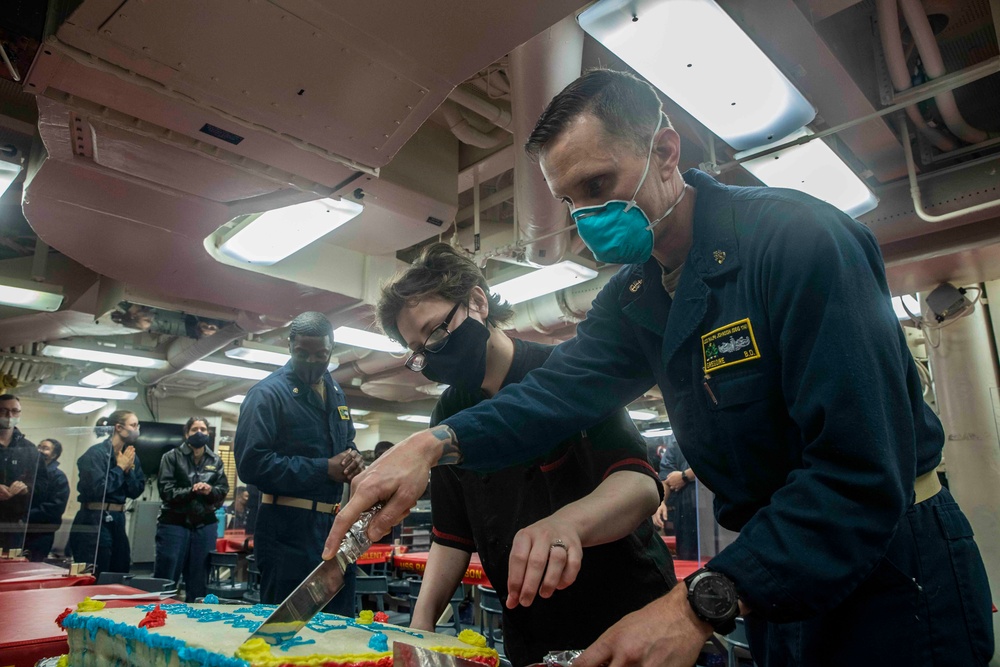 Sailors Aboard USS Ralph Johnson (DDG 114) Celebrate Birthday of Pfc. Ralph Johnson