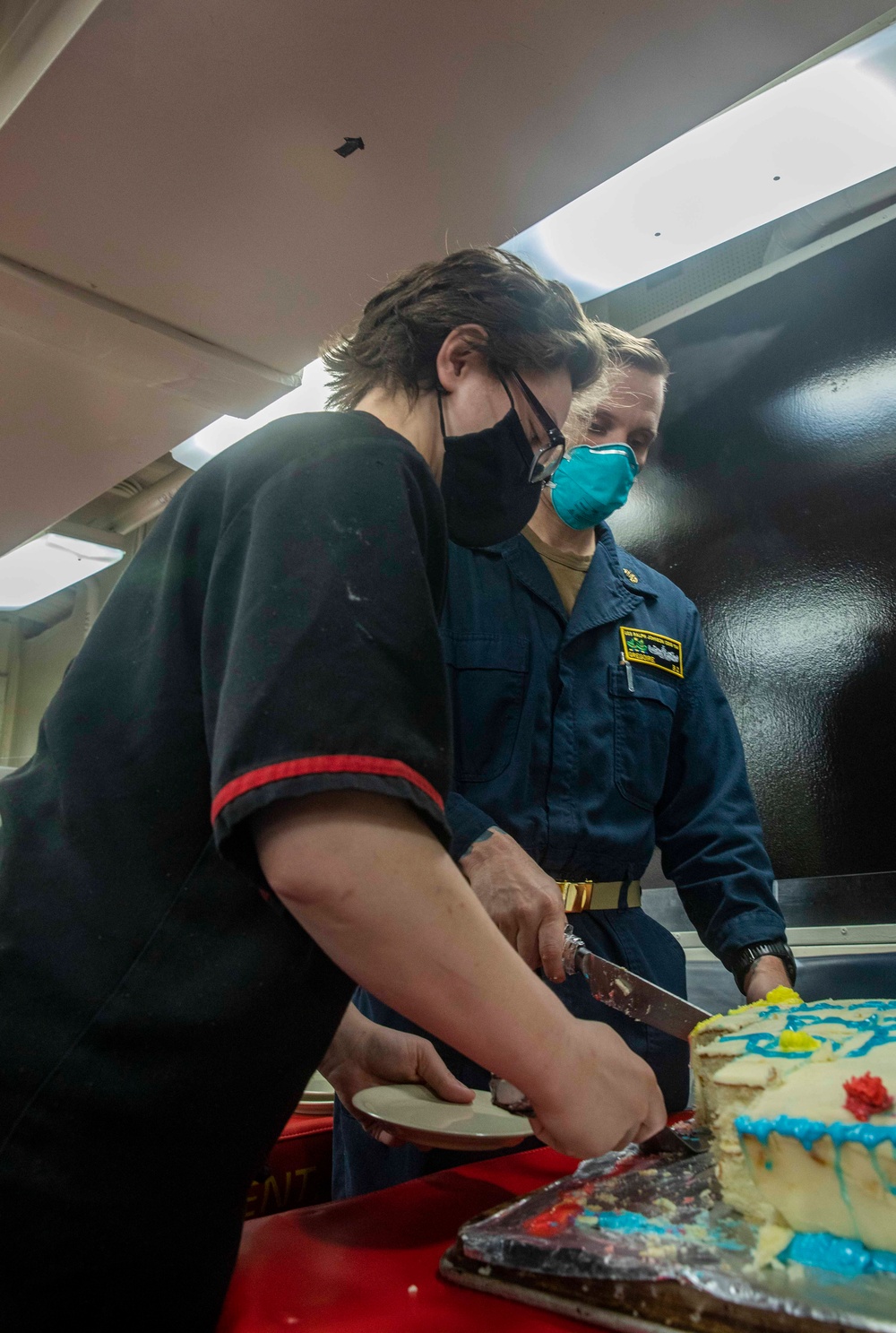 Sailors Aboard USS Ralph Johnson (DDG 114) Celebrate Birthday of Pfc. Ralph Johnson