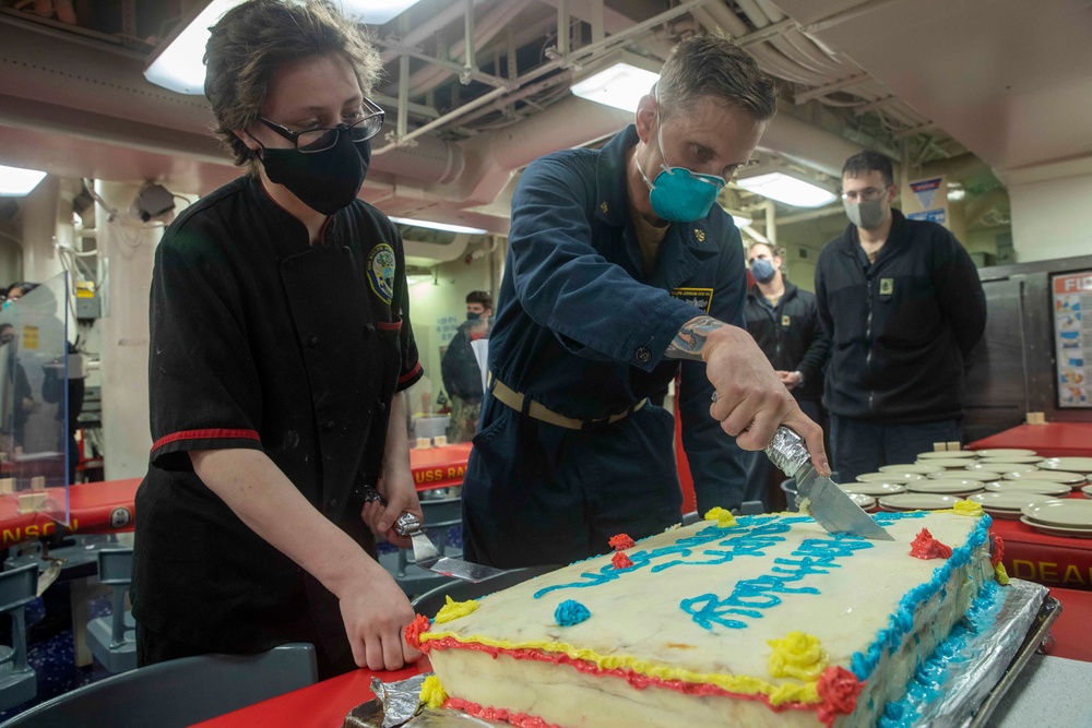 Sailors Aboard USS Ralph Johnson (DDG 114) Celebrate Birthday of Pfc. Ralph Johnson