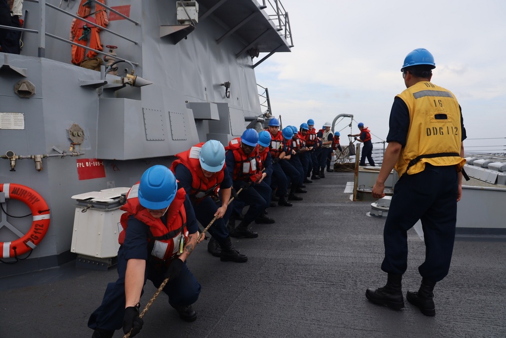 USS Michael Murphy stocks up in the South China Sea