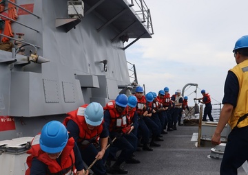 USS Michael Murphy stocks up in the South China Sea