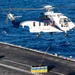 USS Carl Vinson (CVN 70) Conducts Vertical Replenishment-at-Sea with USNS Matthew Perry (T-AKE 9)