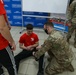 U.S. Soldiers train with Polish students on basic combat lifesaver skills