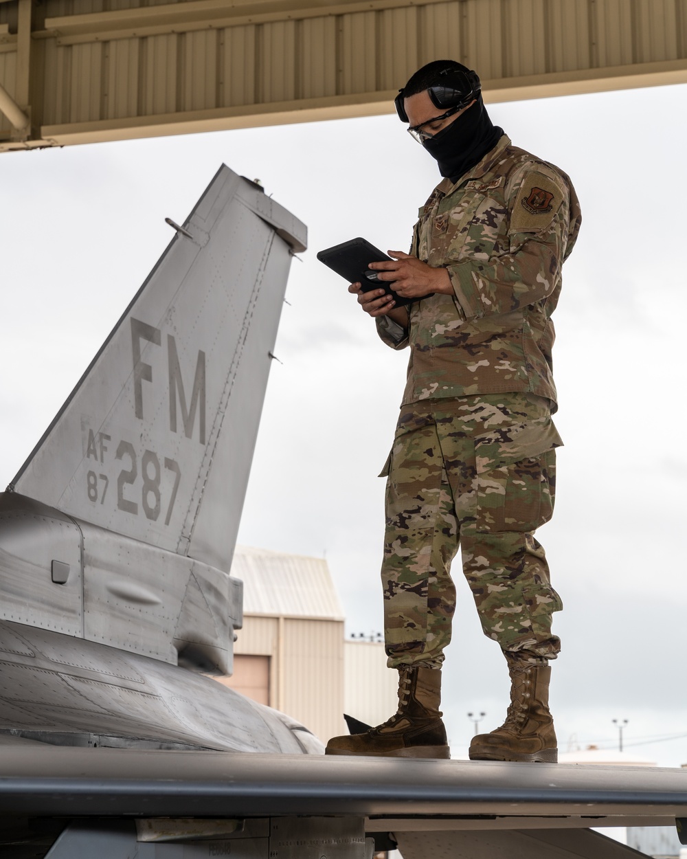 Standing on F-16 Wing