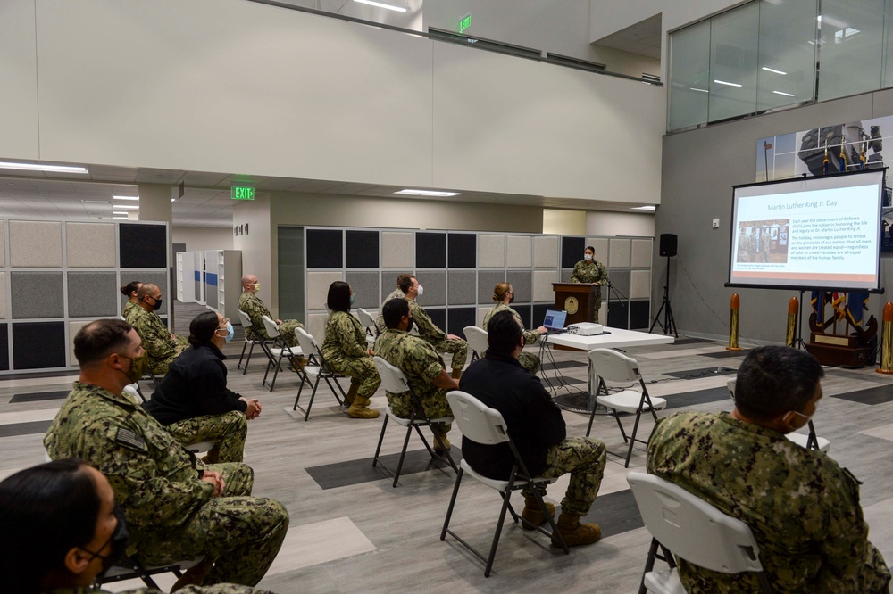 COMLCSRON ONE Sailor speaks during Martin Luther King Jr. Celebration