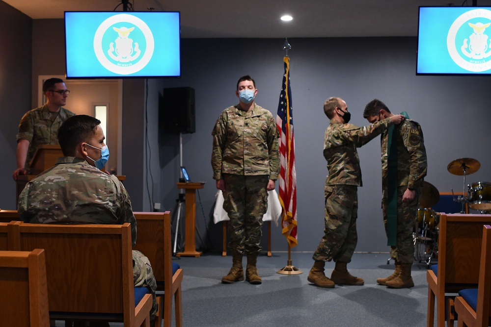 Wing chaplains pass the stole