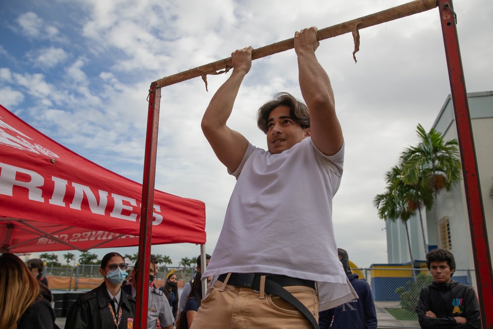 Enhanced marketing vehicle team visits Miami Coral Park Senior High School