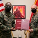Chaplain presents gifts to CLR-37 Commanding Officer on behalf of Pohang Sunrin, Republic of Korea