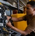 USS Carl Vinson (CVN 70) Sailors Clean Machine Gun