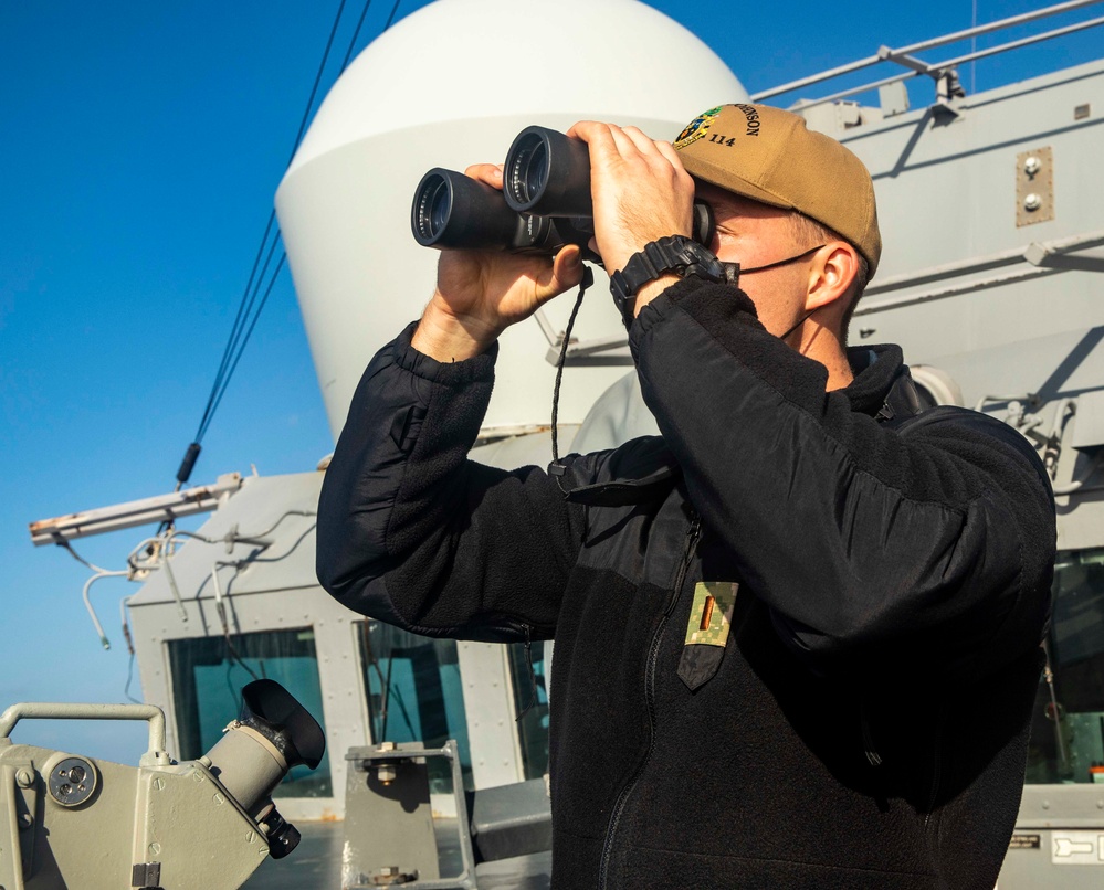 Sailors Aboard USS Ralph Johnson (DDG 114) Stand Watch