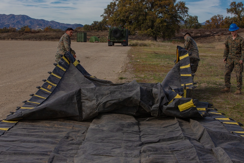 U.S. Marines and Sailors with Marine Wing Support Squadron 373 set up for a FARP during Steel Knight 22