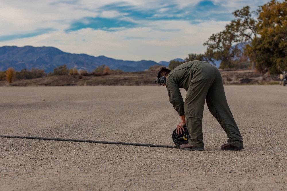 U.S. Marines and Sailors with Marine Wing Support Squadron 373 set up for a FARP during Steel Knight 22