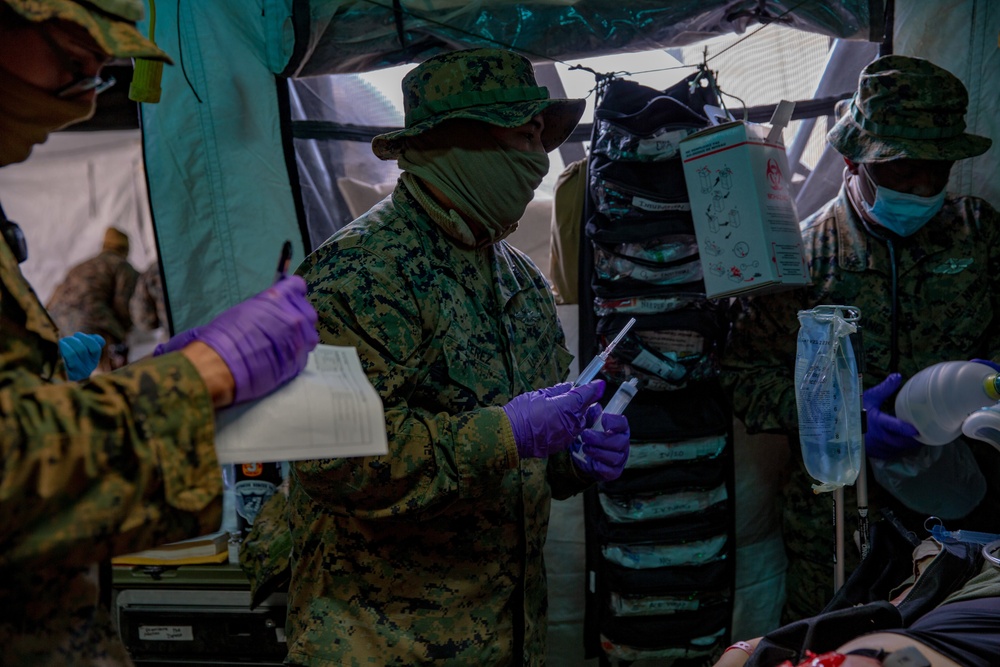 U.S. Marines and Sailors with Combat Logistics Battalion 5 conduct Mobile Combat Operations Center operations during Steel Knight 22