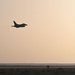 332ND AEW maintenance Airmen, aircraft at sunset