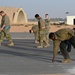 332ND AEW maintenance Airmen, aircraft at sunset