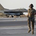 332ND AEW maintenance Airmen, aircraft at sunset