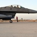 332ND AEW maintenance Airmen, aircraft at sunset