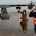 332ND AEW maintenance Airmen, aircraft at sunset