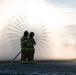 Firefighters assigned to Naval Support Facility Redzikowo, test firehose nozzles