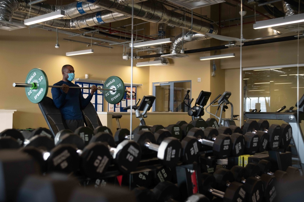 -A Sailor, assigned to Naval Support Facility Redzikowo, lifts weights in the Multipurpose Facility