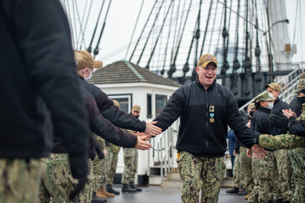 Cmdr. John A. Benda, 76th Commanding Officer of USS Constitution, bids farewell to the officers and crew of Constitution