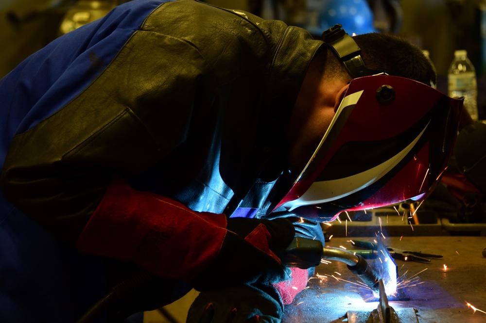 Photo of Coast Guard Damage Controlman Welding