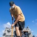 USS Milwaukee Sailors Conduct Freshwater Washdown