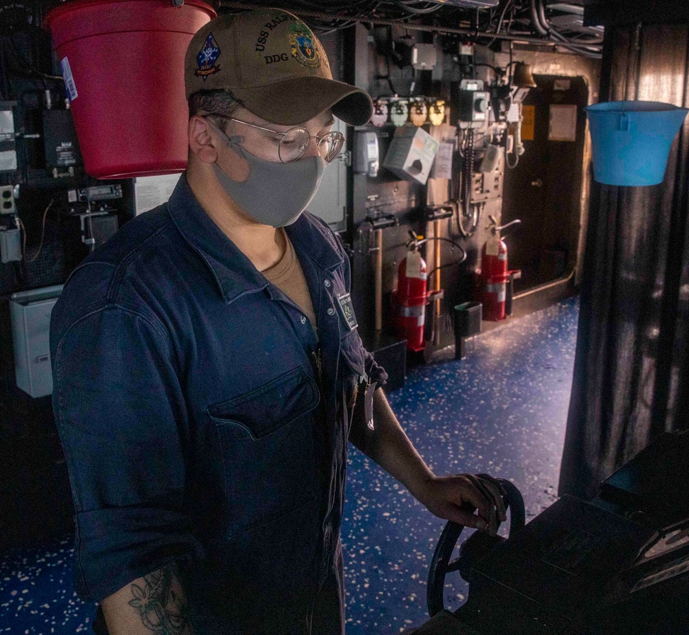 Sailors Aboard USS Ralph Johnson (DDG 114) Stand Watch