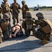 Marines with Combat Logistics Regiment 37 conduct air casualty evacuation drills