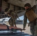 Marines with Combat Logistics Regiment 37 conduct air casualty evacuation drills