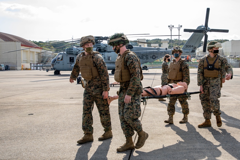 Marines with Combat Logistics Regiment 37 conduct air casualty evacuation drills