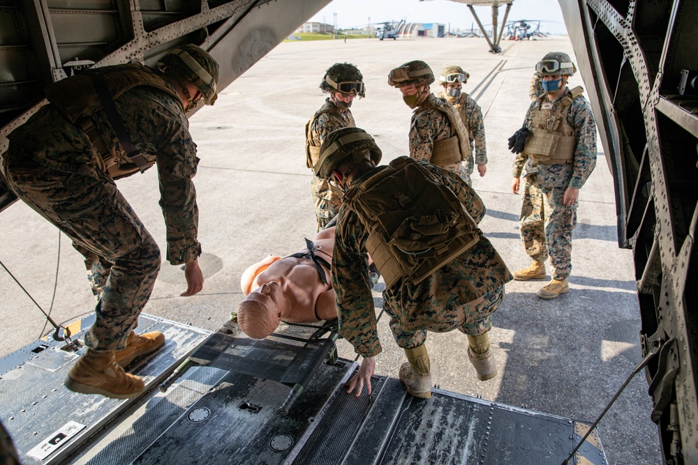 Marines with Combat Logistics Regiment 37 conduct air casualty evacuation drills