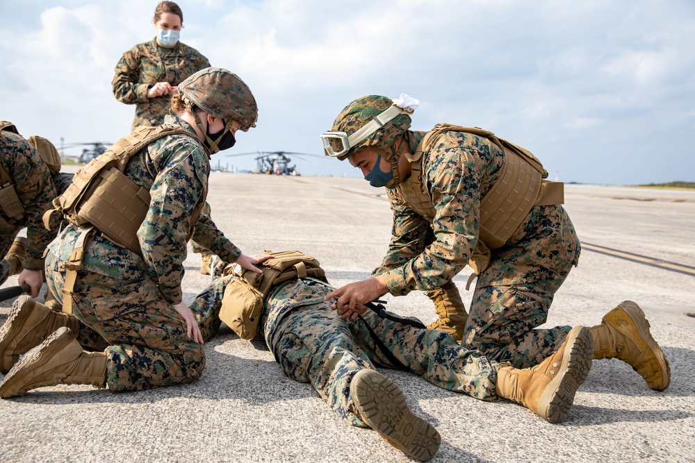 Marines with Combat Logistics Regiment 37 conduct air casualty evacuation drills