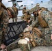 Marines with Combat Logistics Regiment 37 conduct air casualty evacuation drills