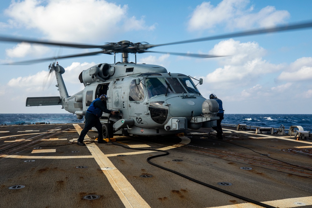 Sailors Aboard USS Ralph Johnson (DDG 114) Conduct Flight Operations