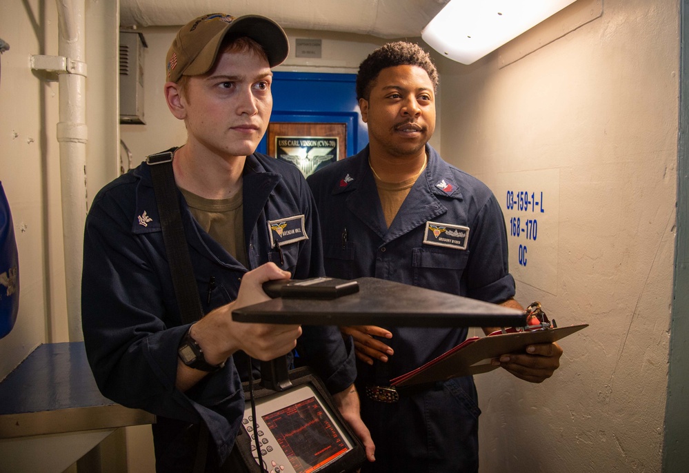 USS Carl Vinson (CVN 70) Sailors Operate a Spectrum Analyzer