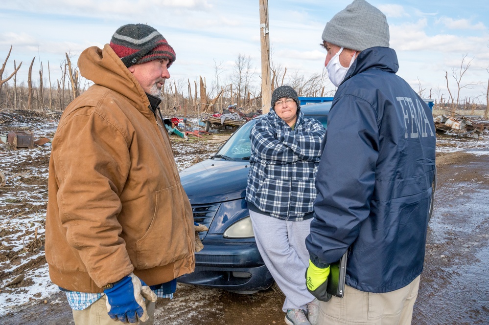 Disaster Assistance Team Talks with Tornado Survivors