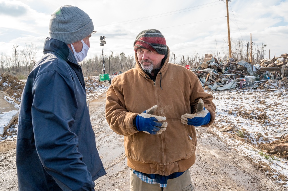Disaster Assistance Team Talks with Tornado Survivor