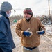 Disaster Assistance Team Talks with Tornado Survivor