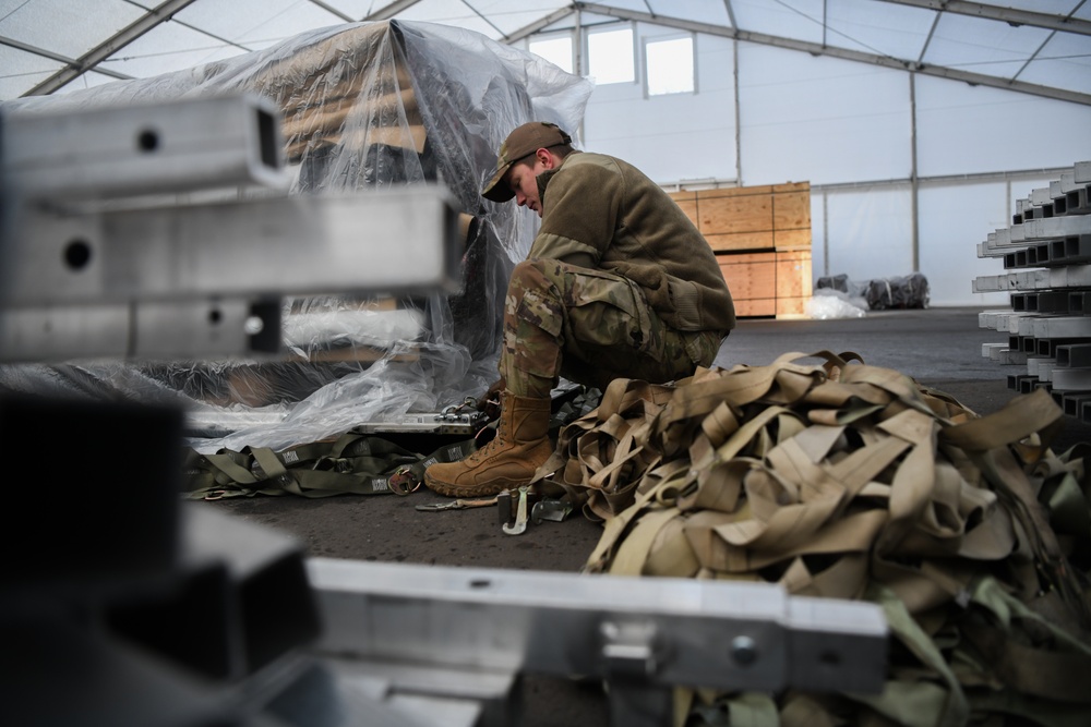 435th AEW Airmen palletize new tents and skins for U.S. and allied service members in Niger