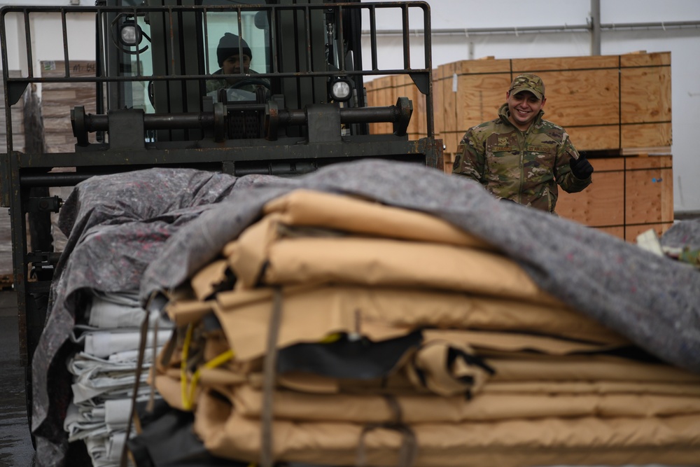 435th AEW Airmen palletize new tents and skins for U.S. and allied service members in Niger