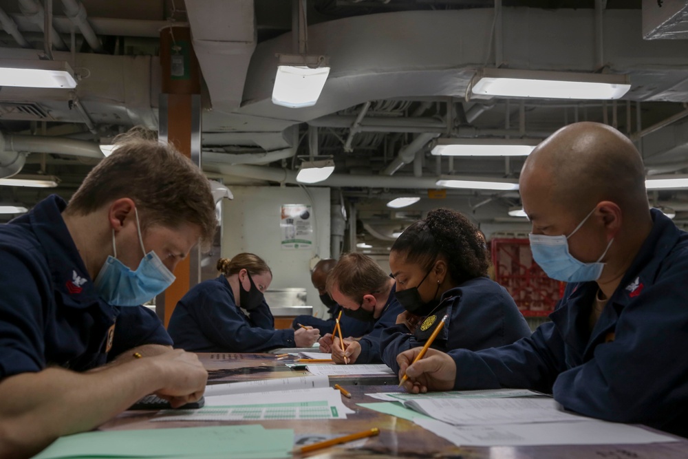 Abraham Lincoln Sailors take the chief exam