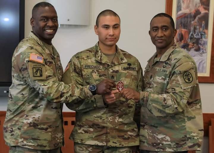 Staff Sgt. Alejandro Preciado, Surgery NCOIC at Veterinary Medical Center Europe, received the MEDCOM coin of excellence.