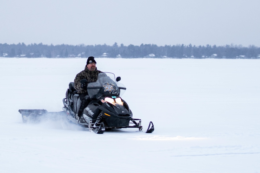 Snowmobile on northern Michigan frozen lake
