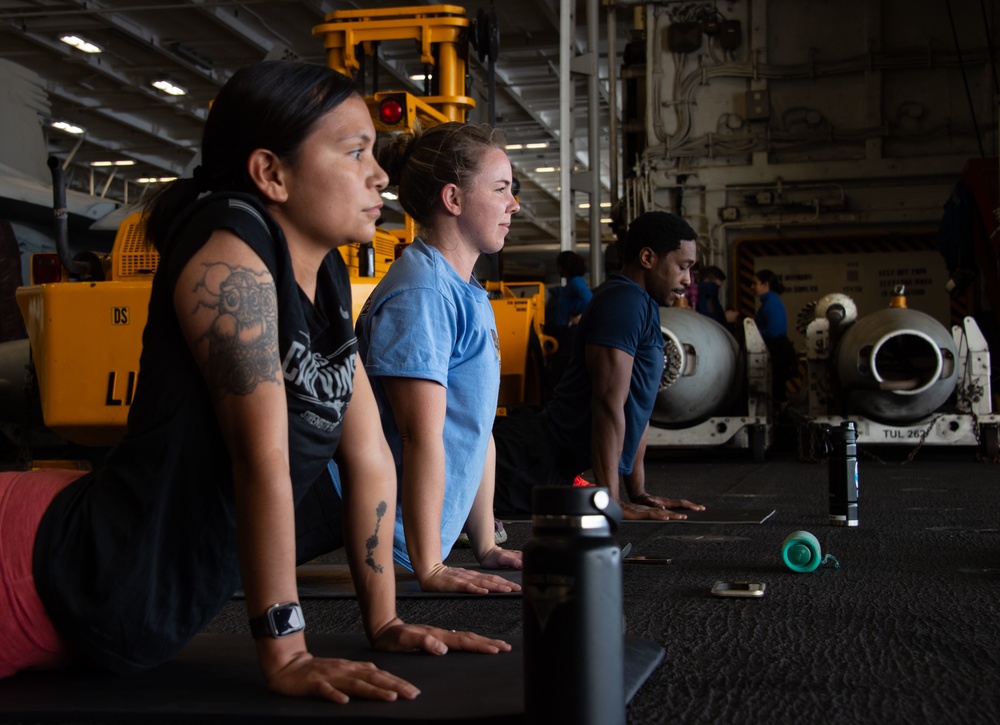 USS Carl Vinson (CVN 70) Sailors Participate in Yoga Class