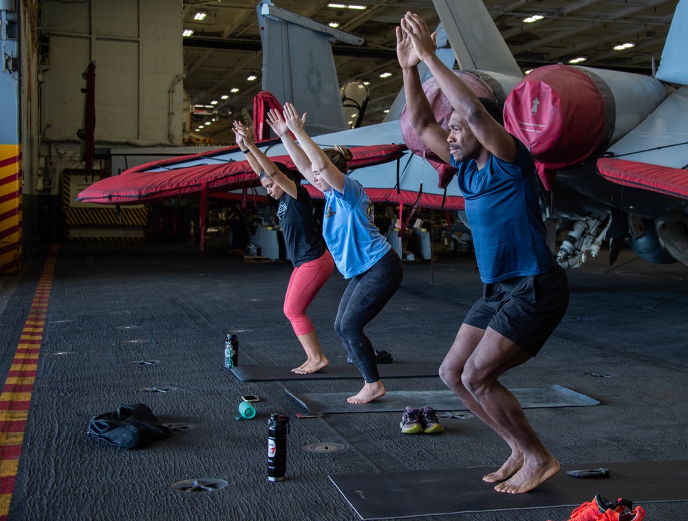 USS Carl Vinson (CVN 70) Sailors Participate in Yoga Class