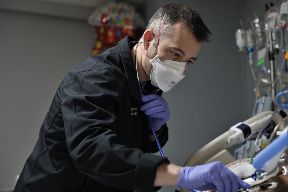 U.S. Navy medical team joins Erie County Medical Center hospital staff’s fight against COVID.