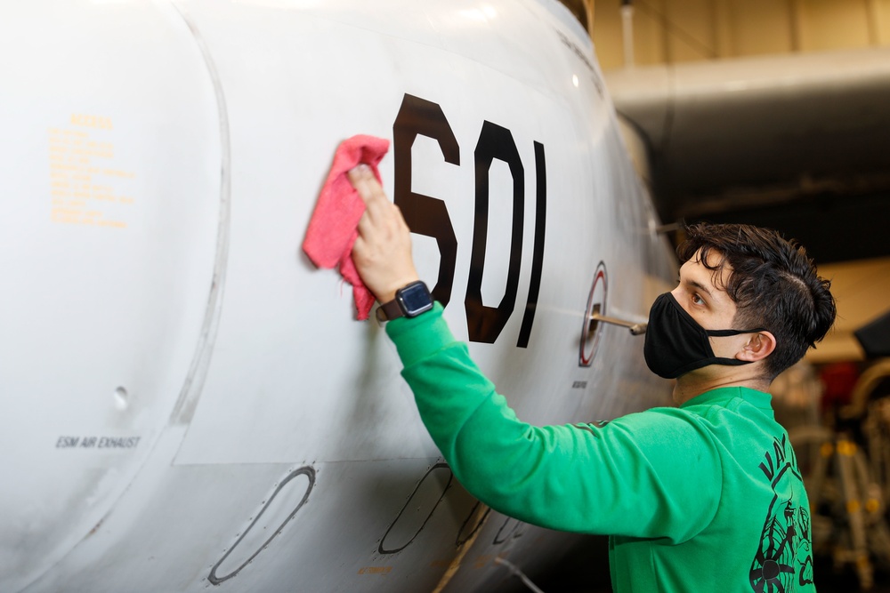 Abraham Lincoln Sailors conduct aircraft maintenance