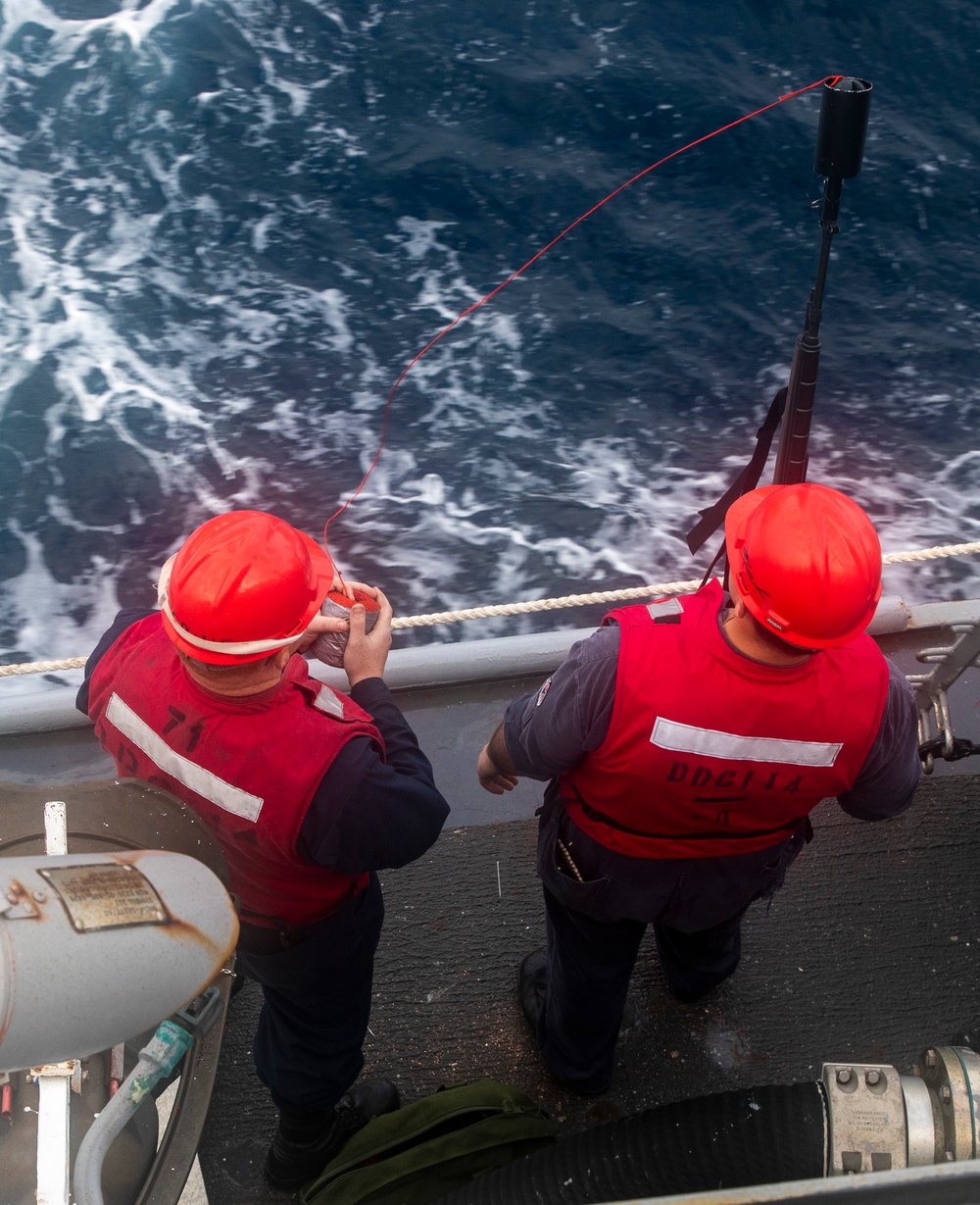 Sailors Aboard USS Ralph Johnson (DDG 114) Conduct Replenishment-at-Sea